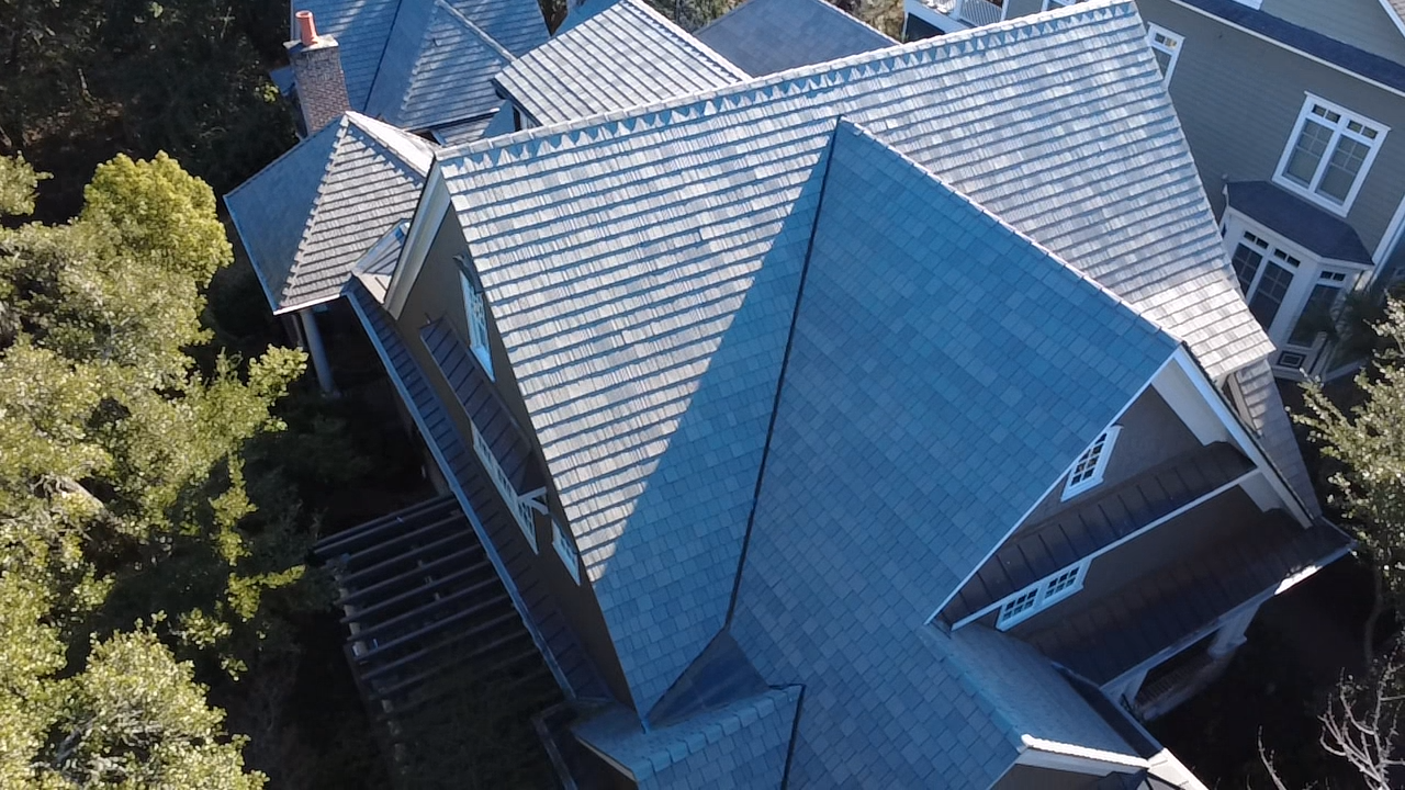 A house with a multi-tone shingle roof.