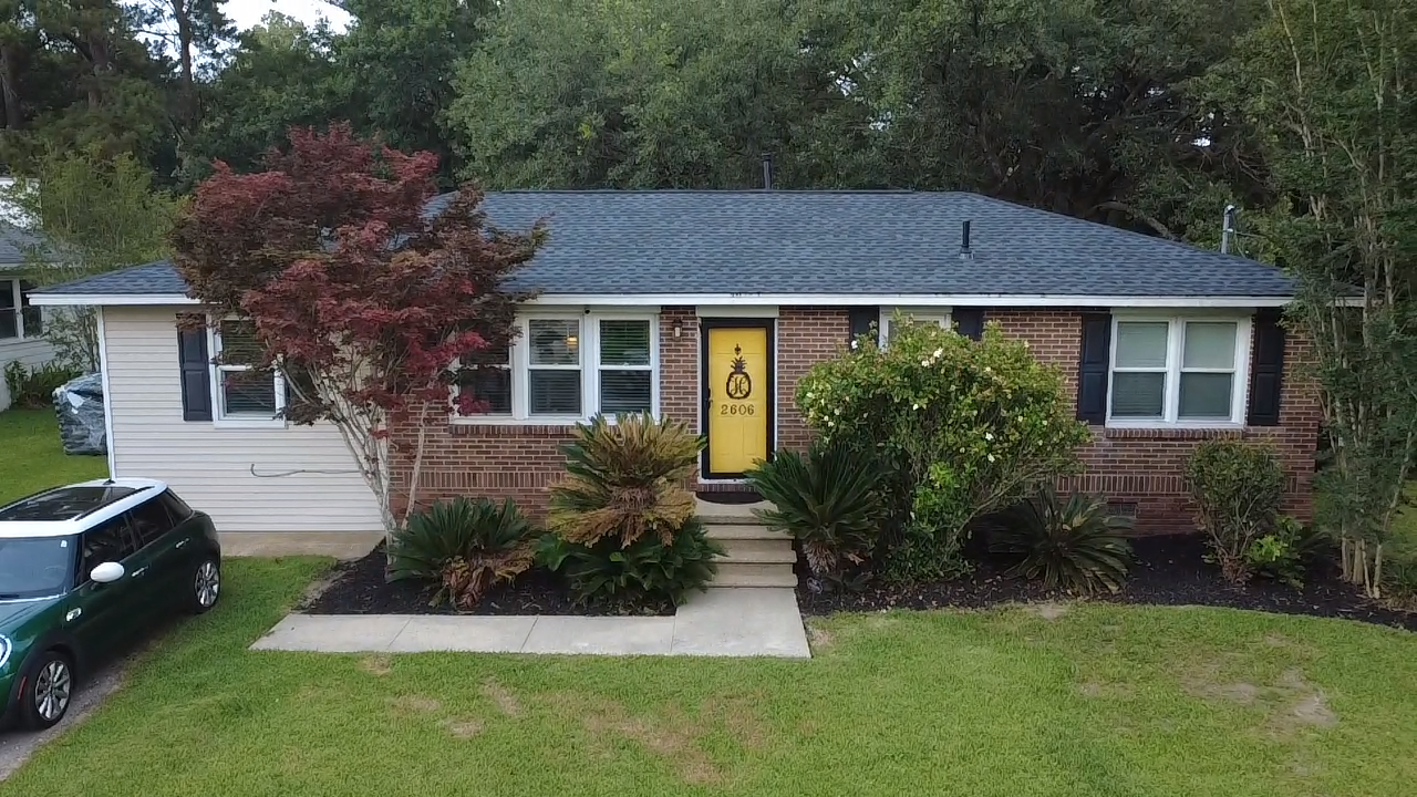 Completed asphalt shingle roof replacement by Big Bear Roofing in Charleston, SC.